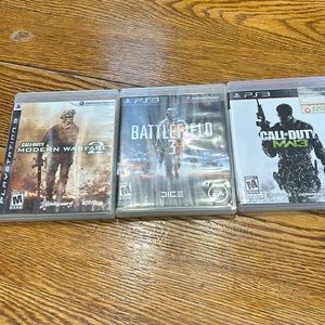 Playstation 3 Call of Duty (2) and Battlefield 3 video games.